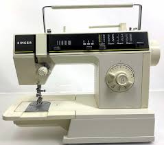 Sold at Auction: Vintage Singer Sewing Machine