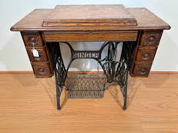 Sold at Auction: Singer Sewing Machine