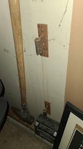 Metal recievers mounted to the walls all around my garage. I know ive seen these in shops/warehouses before but ive got no idea what they are for. : r/whatisthisthing