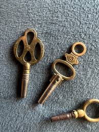 19th Century French Brass Set of Hand Made Clock Keys Different Shape and Size For Sale at 1stDibs