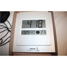 Logitech gaming headphones, atomic clock, Polar T34 chest strap transmitter NIP - Bodnarus Auctioneering