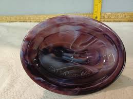 Sold at Auction: Imperial Glass Purple slag Lion on nest