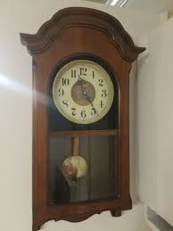 Howard Miller Pendulum Chiming Wall Clock University of ...