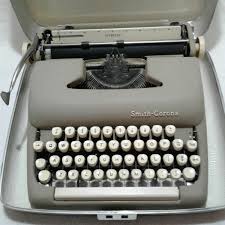 Sold at Auction: Vintage Smith Corona Sterling Portable Typewriter w Hard Case (1962?)