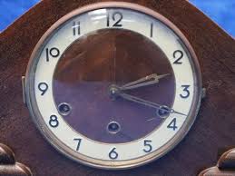 Sold at Auction: TIMBER CASED ART DECO MANTLE CLOCK WITH ...