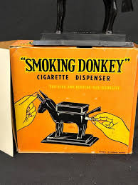 Sold at Auction: Smoking Donkey Cigarette Dispenser OB