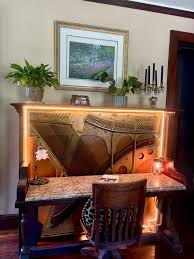 Refinishing an old upright piano into a desk for a 1906 home