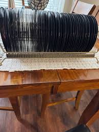 Have 59 -45 rpm records mainly from 1960's -good condition -price includes vintage record rack -some photos reflect a few of the group records -Bartlett porch pickup -cash or cash app or