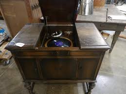 Sold at Auction: VICTROLA RECORD PLAYER CABINET