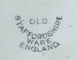 Lot - PAIR OF VICTORIAN STAFFORDSHIRE SHEEP SPILL VASES