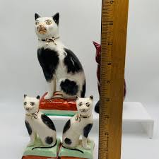 LOT 12: Old Staffordshire Cat Sitting of a Pillow, Royal ...