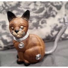 Brown teak wooden vintage cat with silver wire for... | Depop