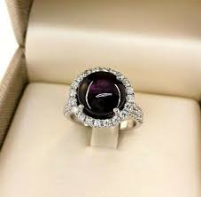 6.05 Carats Diamond and Cabochon Ruby Halo Ring Ruby is 5.07 Carats 14K Gold – NGDC.LA