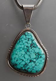 Lot - Navajo Sterling Silver and Turquoise Pendant with an Italian Sterling Silver 'Tubogas' Chain L of pendant: 3-7/8 in; L of necklace: 18 in