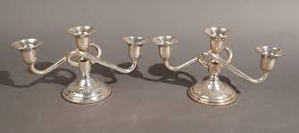 Lot - Pair of Weighted Sterling Silver Three Light Candelabras, H: 4 1/2 in. (11.4 cm.)