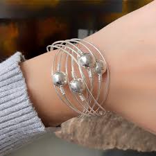 Pulsera de 10 aros en Plata 0.925 con 4 bolas – Joyería Hesse