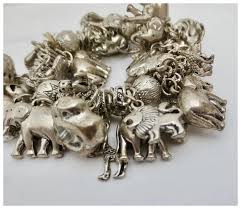 Silver metal African Animals Charm Bracelet. For Sale at ...