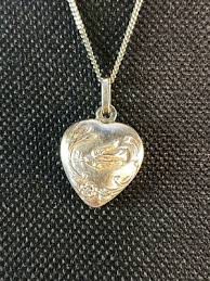 Saint Laurent Heart Shaped Long Charm Necklace With Dove Engraving In Silver | eBay