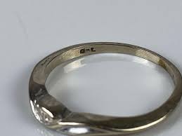 Sold at Auction: 14K White Gold Ring