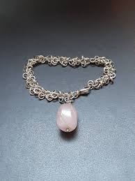 A Vintage Silver Multiple Ring Link, and Rose Quartz ...