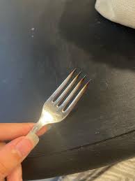 Bought antique silver cutlery, turned black at high heat ...