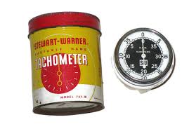 Stewart Warner hand held tachometer # 757-w