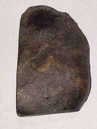 My friend claims it's a meteorite : r/whatsthisrock