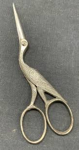 Sold at Auction: Vtg Etched Metal Crane Sewing Scissors