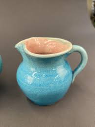 Sold at Auction: 4 PIECES OF PISGAH FOREST POTTERY.