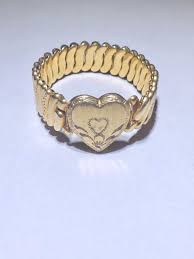 Sold at Auction: D & Co WWII Sweetheart Stretch Expansion Heart Bracelet