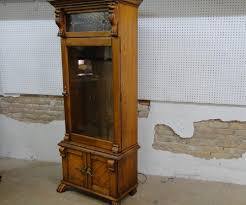 Sold at Auction: Oak Gun Cabinet with Leaded Glass & Lion ...