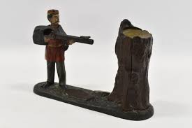 Sold at Auction: J&E Stevens Cast Iron Creedmoor Mechanical Bank