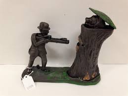 Lot - CAST IRON REPRO MECHANICAL BANK- TEDDY AND THE BEAR