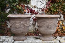 Sold at Auction: A pair of Anduze style terracotta planters ...