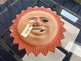 Pottery Sun face, approx 16” - Northern Kentucky Auction, LLC
