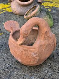 Sold at Auction: Group of 4 urn form terracotta planters ...