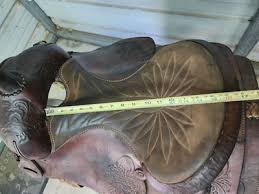 A good Used Older 15" Brown Color Action Co. Roping Saddle ...