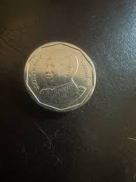 I have just found this coin in my coat pocket. I'm utterly ...