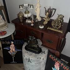 Teléfono Y Estatua $100