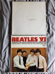 I added these two to my collection today. The Beatles VI is ...