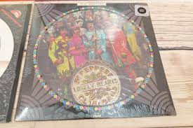 Sold at Auction: Lot of 4 Vinyl Picture Disc Records