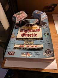 I found some papercraft cargo containers. My printer taco'd the card stock. I found my choice of paperweight amusing. : r/XWingTMG