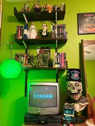Finally finished the mostly horror themed, MCM guestroom 💚