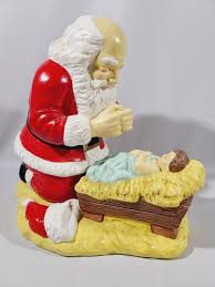 Santa Kneeling Praying To Baby Jesus Ceramic Art Figurine ...