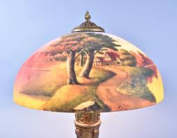 Lot - An Early 20th Century Reverse Painted Glass Table Lamp ...