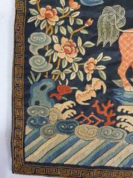 Lot 369 - A PAIR OF CHINESE MILITARY OFFICIAL'S QILIN