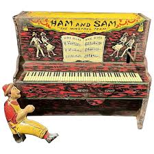 Ferdinand Strauss Ham & Sam Minstrel Tin Litho Windup Piano. For Sale at Ruby Lane