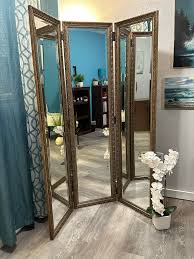 Elevate your space with this beautiful ornate trifold mirror ...