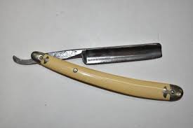 Sold at Auction: Kinfolks Real Red Point Straight Razor