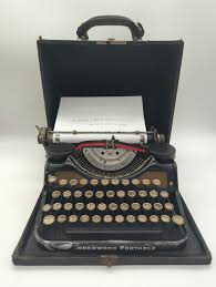 1930 Black and Gold Underwood Portable 4 Bank Portable ...